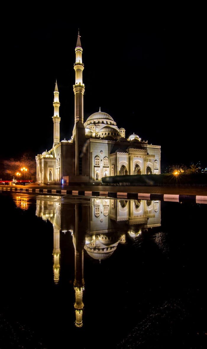 Illuminated at Night Al Noor Mosque in Sharjah, the United Arab Emirates