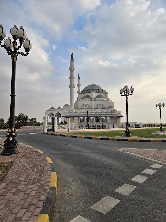 Street and Decorative Lanterns by Sharjah Mosque in United Arab Emirates